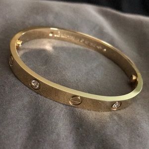 Gold love bracelet with rhinestones